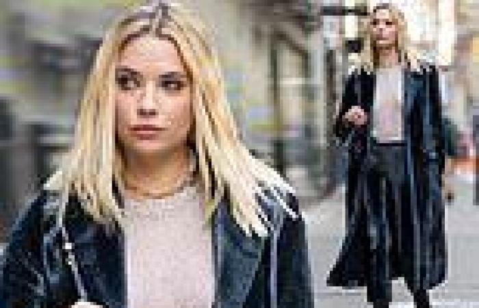 Ashley Benson cuts stylish figure in trench coat and matching trousers as she ...