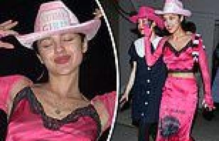 Olivia Rodrigo rocks a pink satin crop top with a skirt and cowboy hat for 19th ...