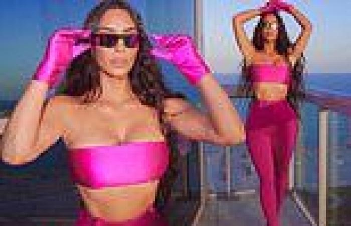 Kim Kardashian is hot in pink as she poses up a storm in SKIMS bandeau and ...