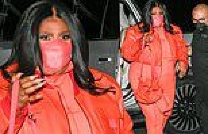 Lizzo rocks bright orange sweats and jacket as she dines with SNL cast ahead of ...