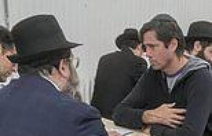 sport news Mystery surrounds photo of AFL supremo Gil McLachlan speaking with Orthodox ...