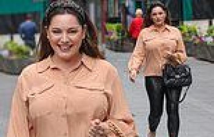 Kelly Brook looks effortlessly chic in a peach chiffon blouse ...