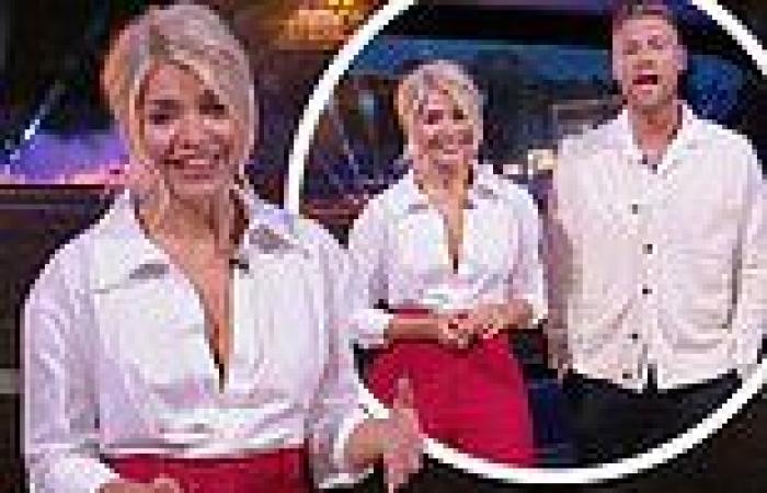 Thursday 12 May 2022 10:14 PM Holly Willoughby looks effortlessly stylish in a plunging white shirt trends now
