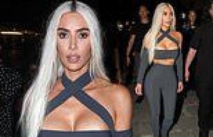 Saturday 21 May 2022 01:01 AM Kim Kardashian puts on a busty display in a grey crop top as she joins her ... trends now