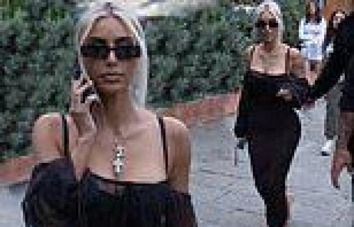 Saturday 21 May 2022 09:25 PM Kim Kardashian exhibits her hourglass figure in a tight black maxi dress before ... trends now