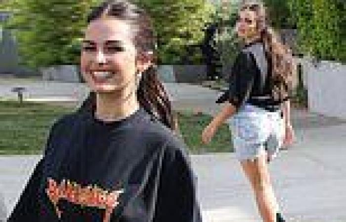 Sunday 22 May 2022 07:19 AM Addison Rae cuts relaxed figure in a black Balenciaga tee and cut-off shorts as ... trends now