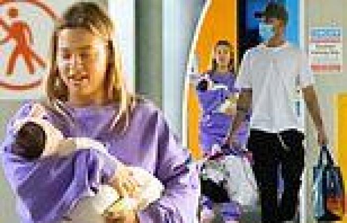 Monday 20 June 2022 02:22 AM Tammy Hembrow cradles her newborn daughter as she leaves hospital trends now