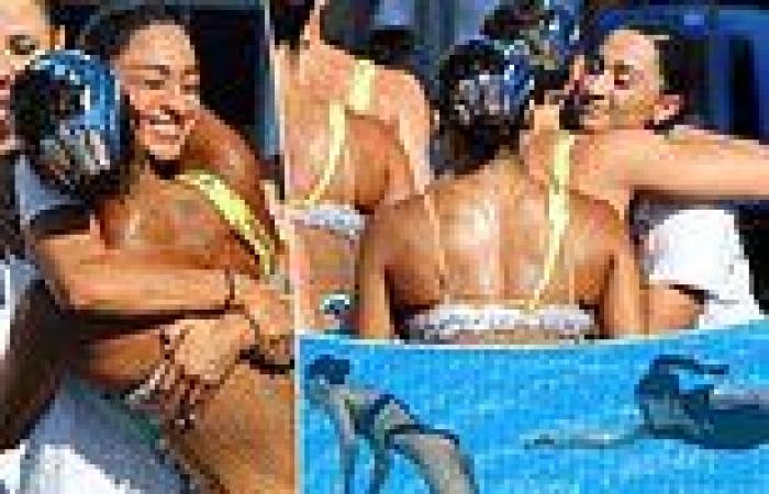 sport news Anita Alvarez is seen congratulating team-mates after fainting in the pool at ... trends now