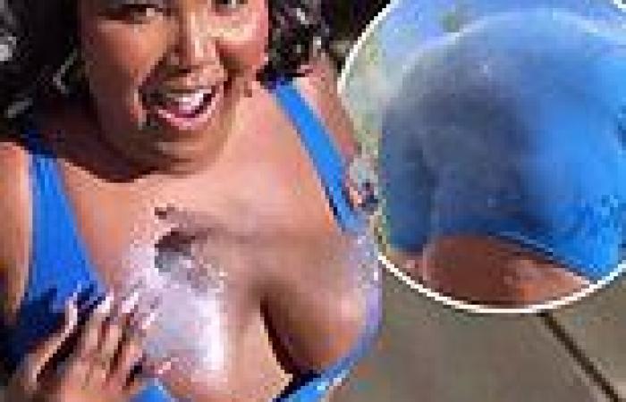 Friday 1 July 2022 05:12 AM Lizzo gets showered in glitter as she shows off her cleavage and twerking skills trends now