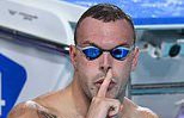 sport news Kyle Chalmers gestures after winning gold in the 100m freestyle at the ... trends now