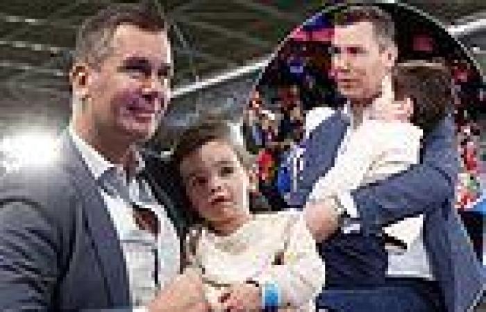 Sunday 7 August 2022 11:46 PM Wayne Carey cradles his rarely-seen baby son as he attends AFL game trends now