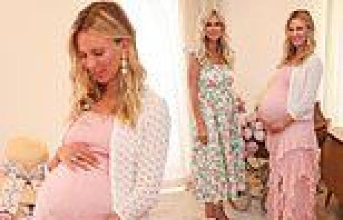Monday 8 August 2022 06:13 PM Pregnant Tessa Hilton cradles her bump in a pink ruffled maxi dress at baby ... trends now