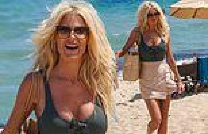 Tuesday 16 August 2022 10:43 PM Victoria Silvstedt, 47, wows in a plunging khaki swimsuit as she hits the beach ... trends now