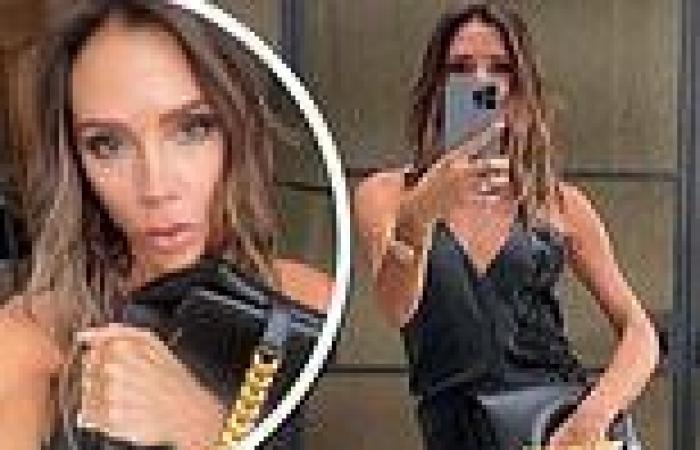 Wednesday 21 September 2022 01:47 AM Victoria Beckham poses up a storm in a black silk midi dress as she flaunts her ... trends now