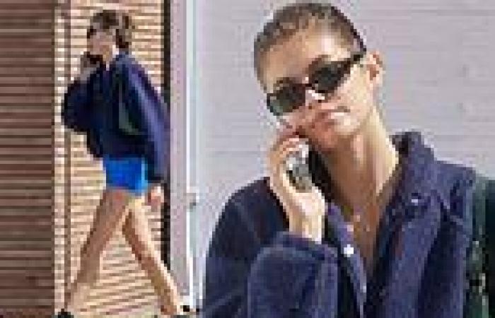 Friday 7 October 2022 11:34 PM Kaia Gerber shows off her long legs in skintight TINY blue spandex shorts trends now