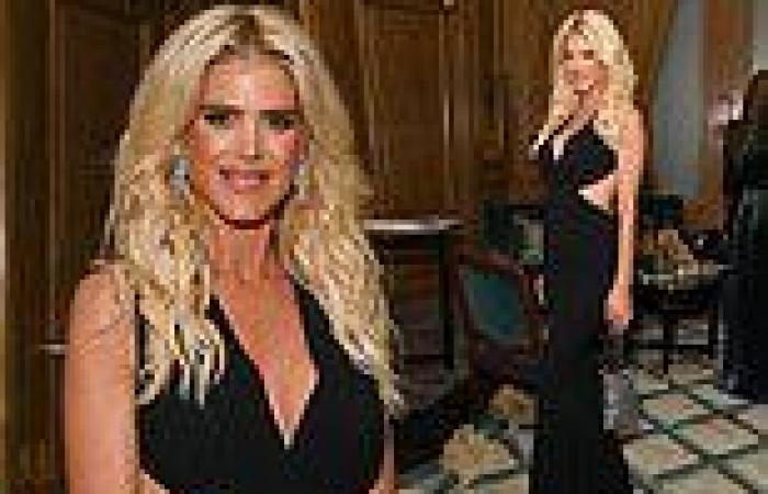 Friday 14 October 2022 10:58 PM Victoria Silvstedt puts on a busty display in a sexy black cut-out jumpsuit trends now