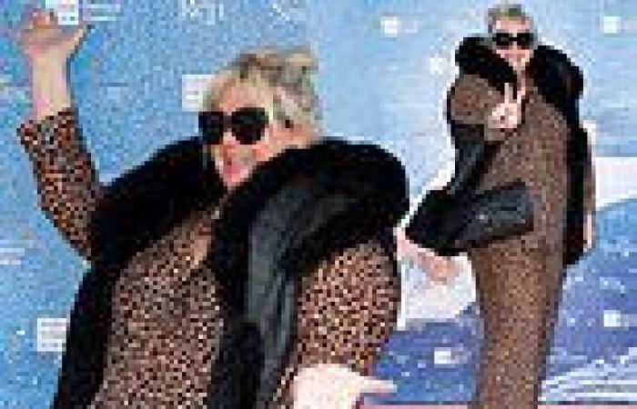 Saturday 19 November 2022 07:17 PM Gemma Collins throws up the peace signs as she poses at the Snowman 25th ... trends now