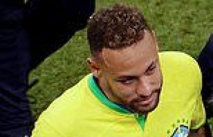 sport news Distraught forward Neymar is seen with his head in his hands after coming off ... trends now