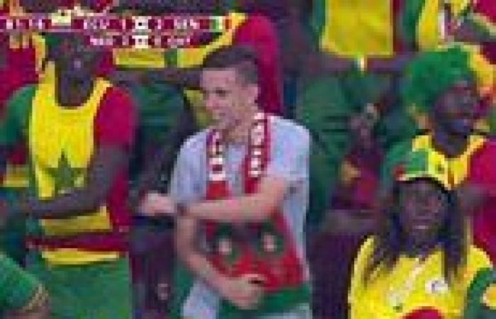 sport news Morocco fan goes viral as he dances along with Senegal supporters at the FIFA ... trends now