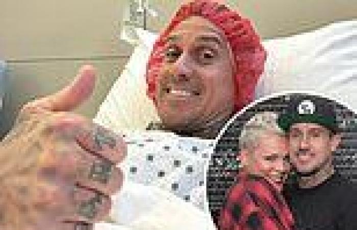 Pink's husband Carey Hart gives a thumbs-up while preparing to undergo surgery ... trends now