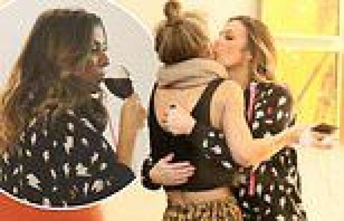 Kym Marsh plants a kiss on Helen Skelton at VERY boozy Strictly Christmas party trends now