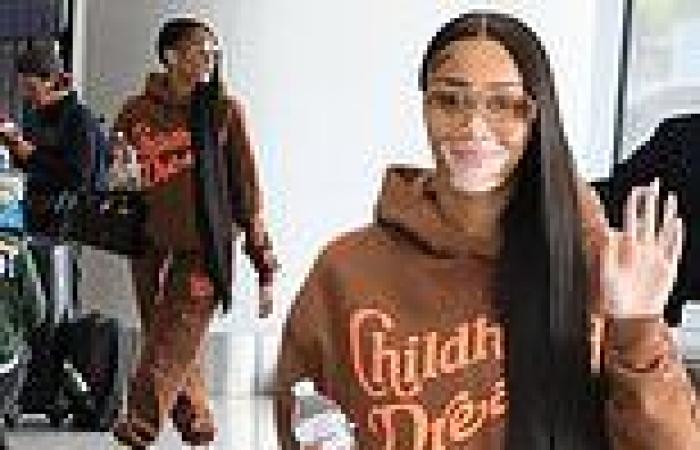 Winnie Harlow opts for casual comfort in stylish hoodie as she preps to board a ... trends now