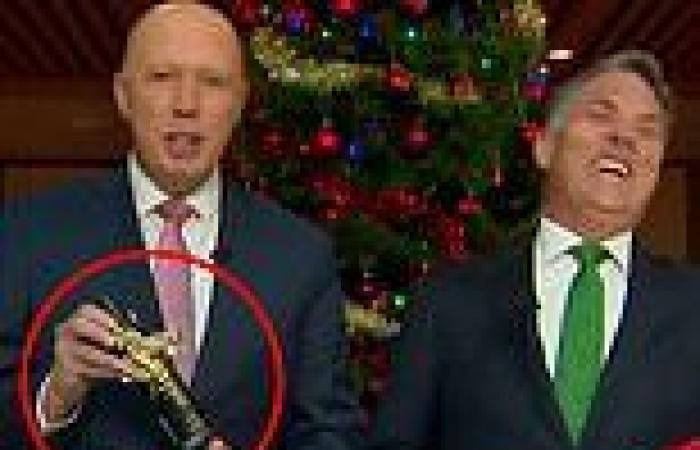 Peter Dutton gives a bottle of fake tan to Deputy Prime Minister Richard Marles ... trends now