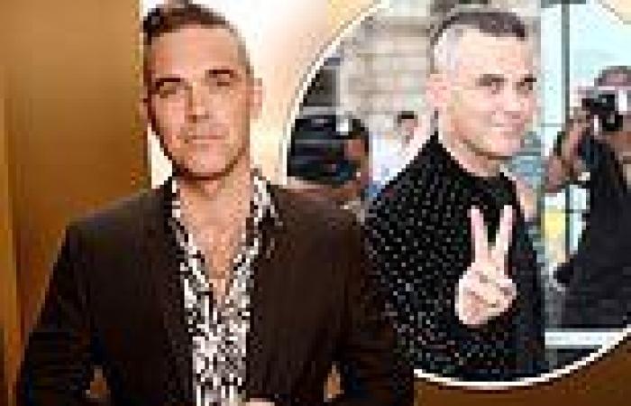 Robbie Williams teases launch of his own talent show trends now