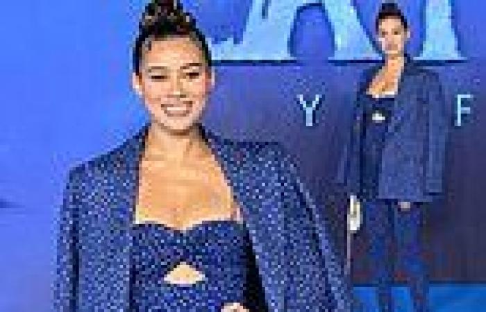 Montana Brown looks stylish in a blue dot jumpsuit at the Avatar: The Way Of ... trends now