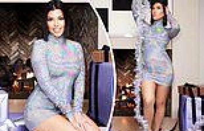 Kourtney Kardashian sparkles in a silver mini dress as she promotes Lemme Focus trends now