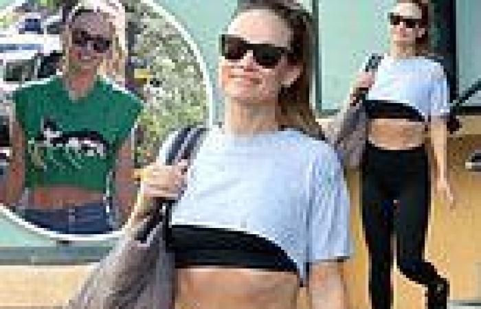 Olivia Wilde is all smiles as she shows off her ripped abs in two crop tops ... trends now