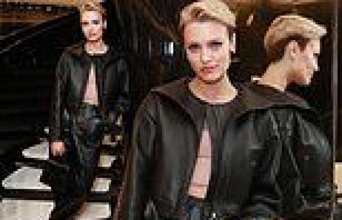 Wallis Day cuts a stylish figure in a leather jacket and trousers at store ... trends now