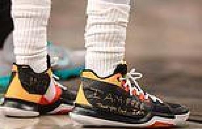 sport news Embattled Kyrie Irving tapes message over Nike sneakers during the Nets' win ... trends now