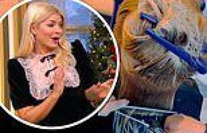 Holly Willoughby's fans left shocked as she trusts son Chester, eight, to cut ... trends now