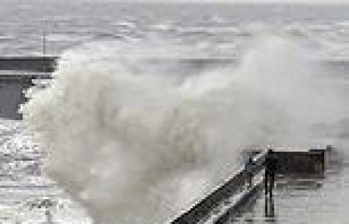 Adult walks with child just feet from massive crashing seafront wave: Met ... trends now