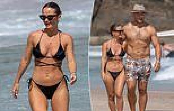 NRL star Sam Burgess and new girlfriend Lucy Graham hit the beach trends now
