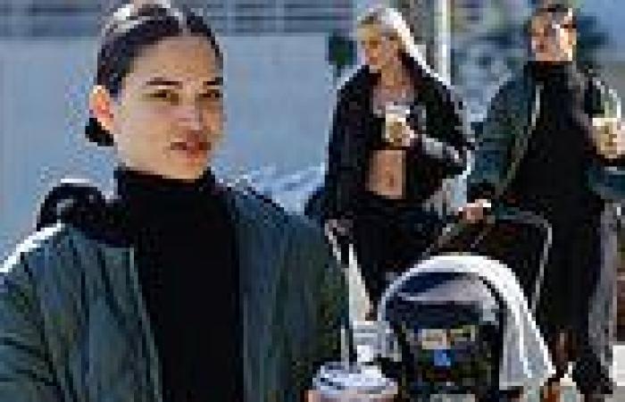 Shanina Shaik bundles up while enjoying a stroll with her four-month-old son ... trends now