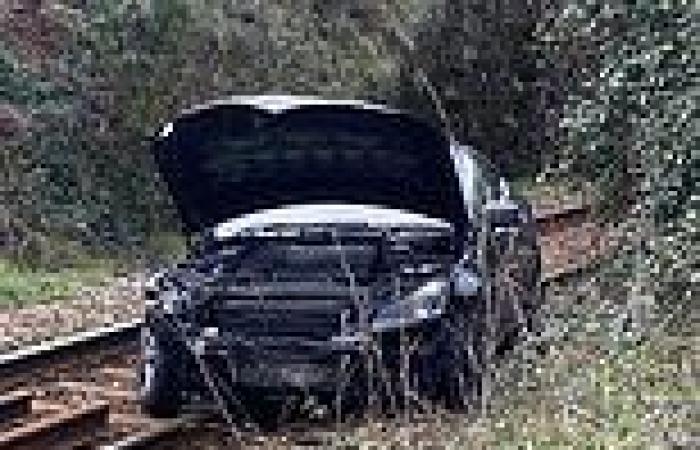 Parking mad! Police hunt for driver of Mercedes dumped on train tracks in ... trends now