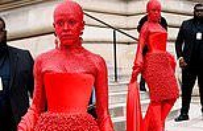 Doja Cat in head-to-toe red body paint at the Schiaparelli show during Paris ... trends now
