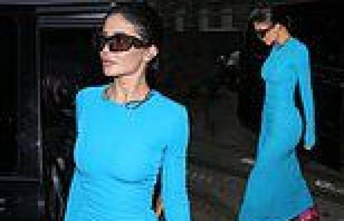Kylie Jenner shows off her hourglass curves in a figure-hugging bright blue ... trends now