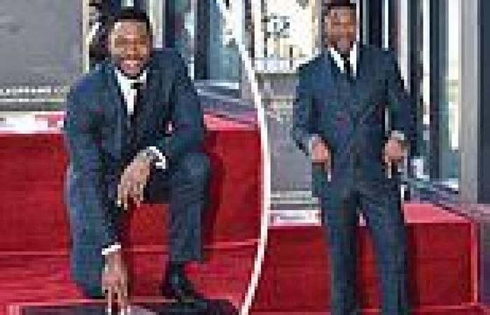 Michael Strahan beams with pride as he poses next to star at his Hollywood Walk ... trends now
