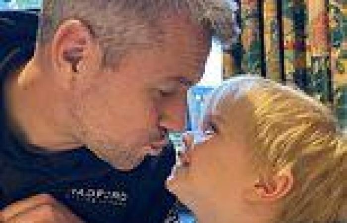 Ant Anstead shares an adorable photo of himself giving son Hudson, three, a kiss trends now