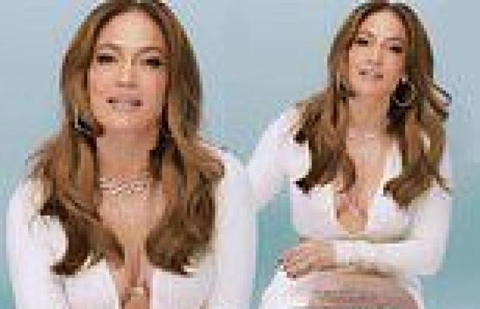 Jennifer Lopez models a plunging dress as she talks love while pushing her ... trends now