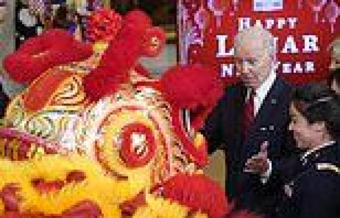 Jill Biden drags Joe onstage to pose with dragon dance group - but says no ... trends now