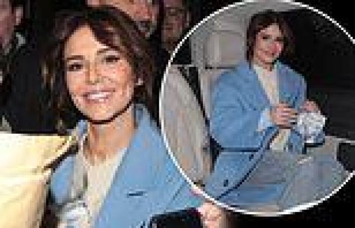 Cheryl smiles and laughs with fans as she is greeted by a huge crowd trends now