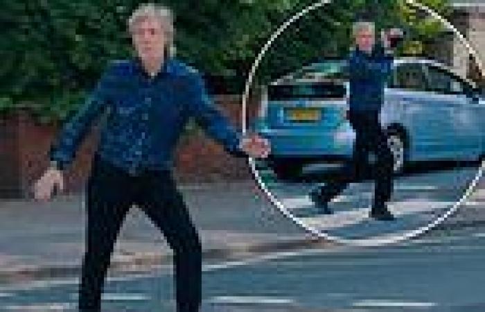Sir Paul McCartney waves arms in air after he was nearly HIT by a car trends now