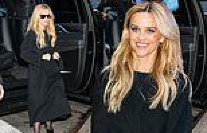 Reese Witherspoon wows in chic black coat as she puts on a fashionable display trends now