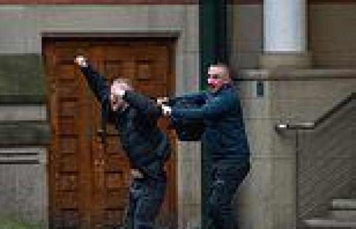 Two louts with 20 previous offences combined celebrate outside court as they ... trends now