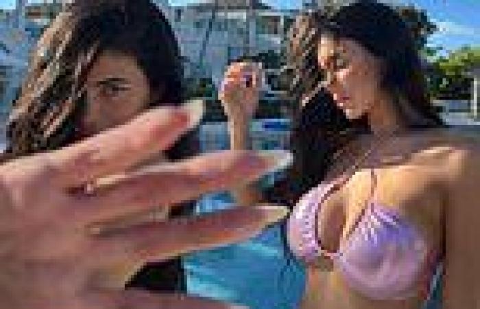 Kylie Jenner shows off toned midriff in a metallic pink bikini on sunny ... trends now