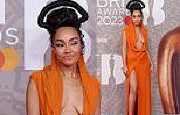 Leigh-Anne Pinnock stuns as she goes braless in an orange draped gown on at The ... trends now